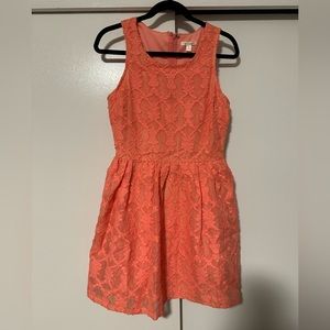 Francesca’s women’s dress in coral pink